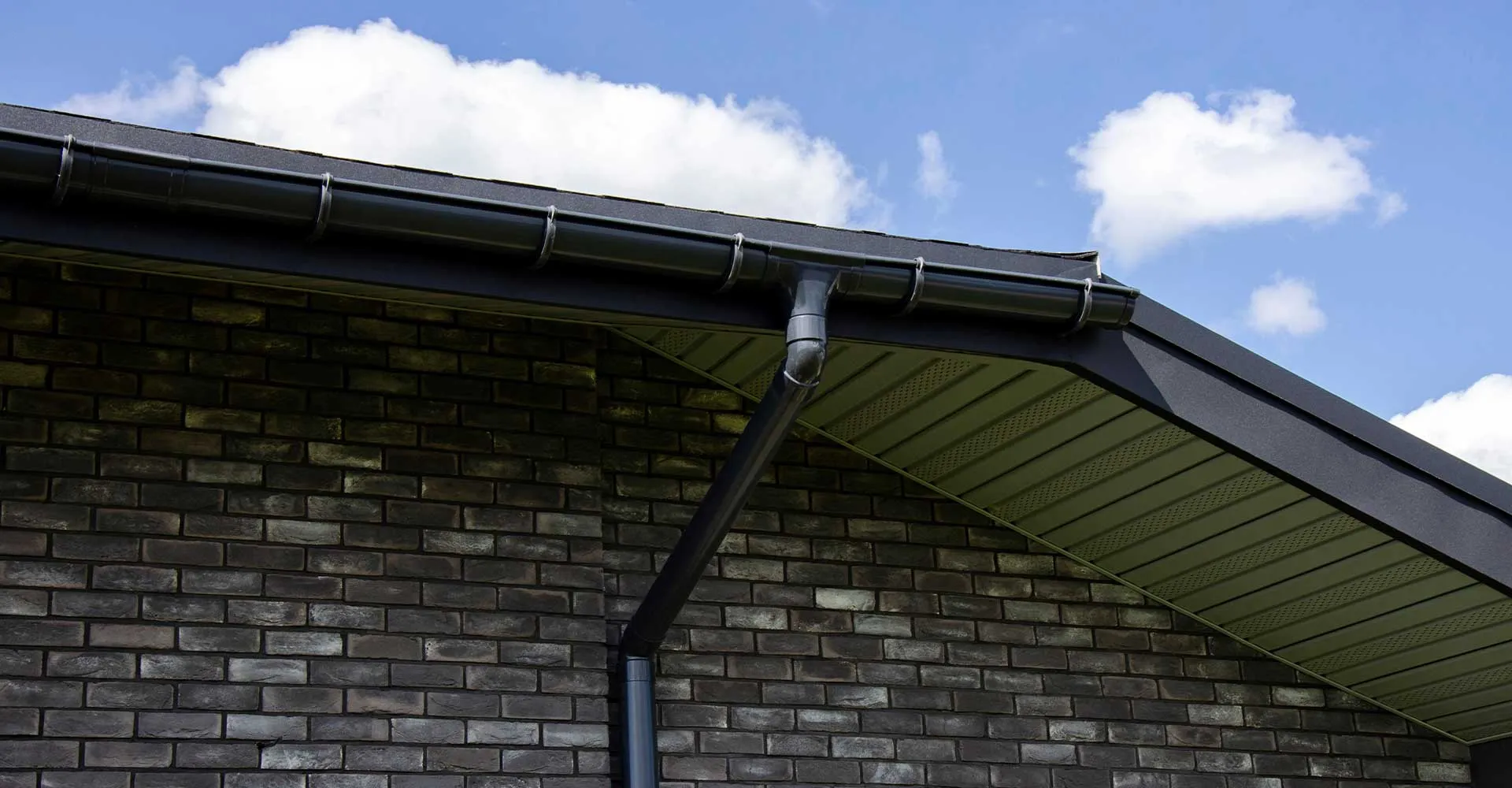 Gutter and downspout on a brick home in Baton Rouge, LA